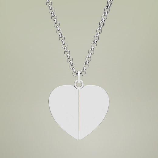 Hidden Message Heart Necklace close-up — laser-engraved detail on butterfly-hinge stainless steel locket